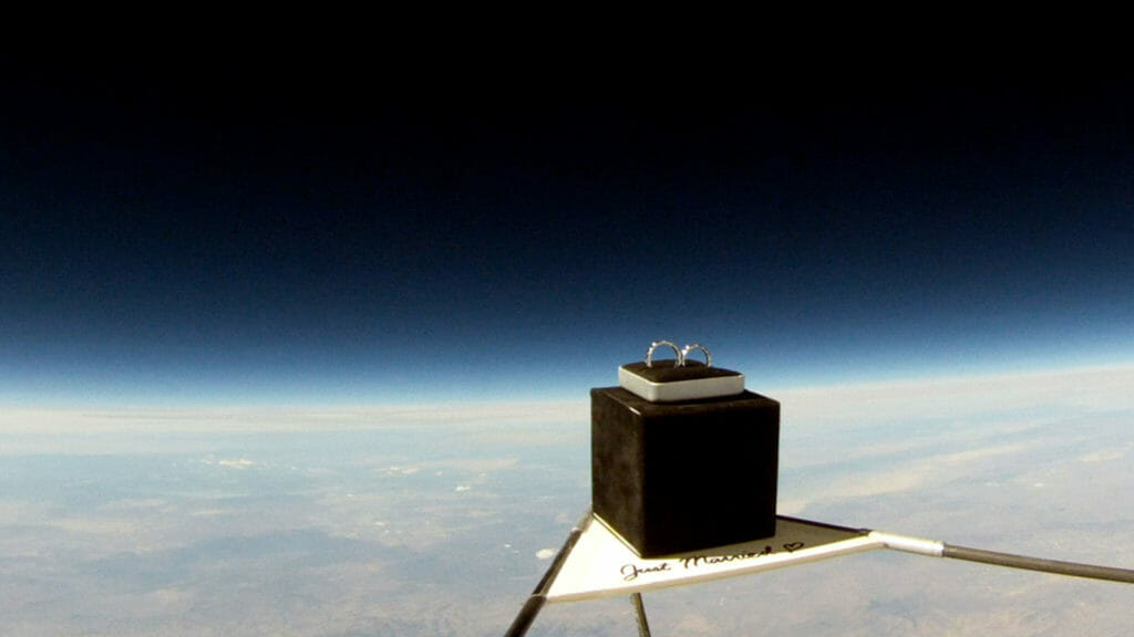 A pair of wedding rings floating in space